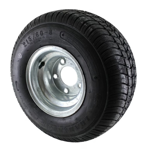 Black tire with silver rim on a white background