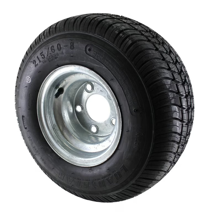 Black tire with silver rim on a white background