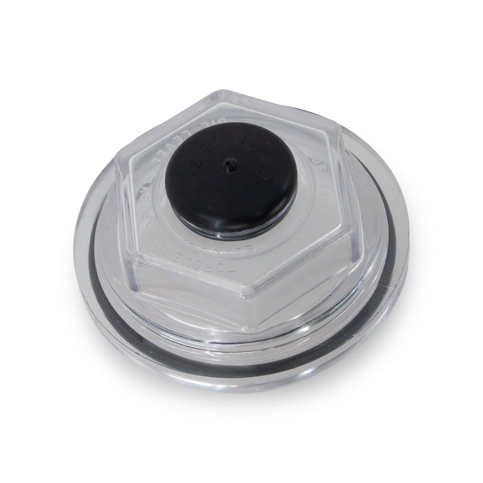 Clear plastic lid with black center on a white background