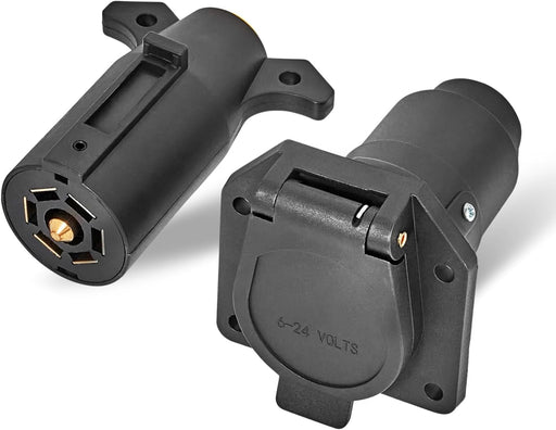 Two black electrical connectors on a white background