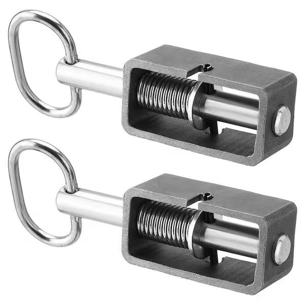 Two metal spring-loaded components on a white background