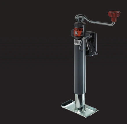 Metal jack with a red handle on a black background